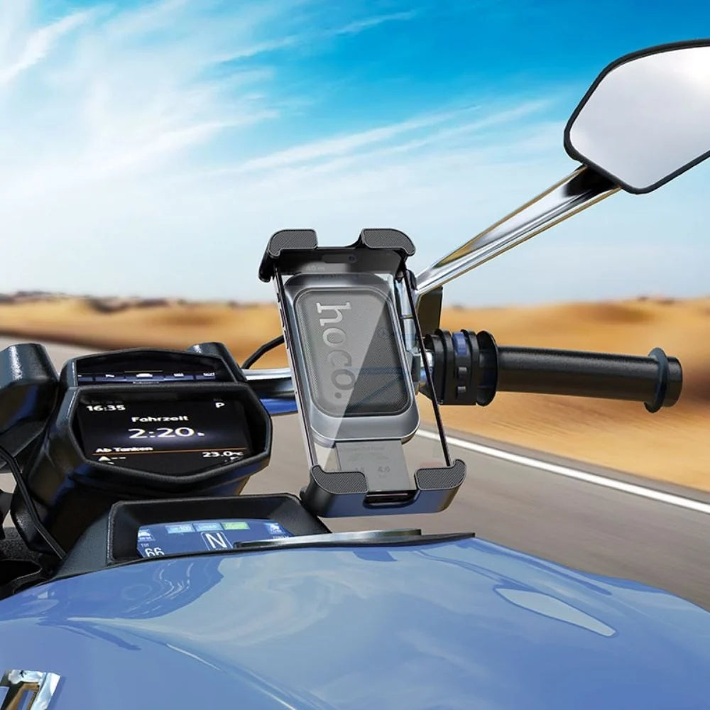 Hoco H82 Vista handlebar bike phone holder attached to a bicycle, secure grip for smartphone during rides.