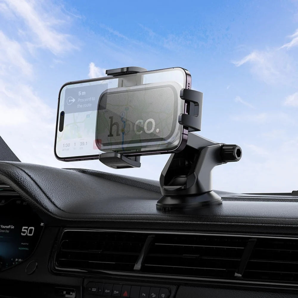 Hoco H79 Vista car dashboard phone holder attached to a vehicle dashboard, enabling hands-free phone use while driving.