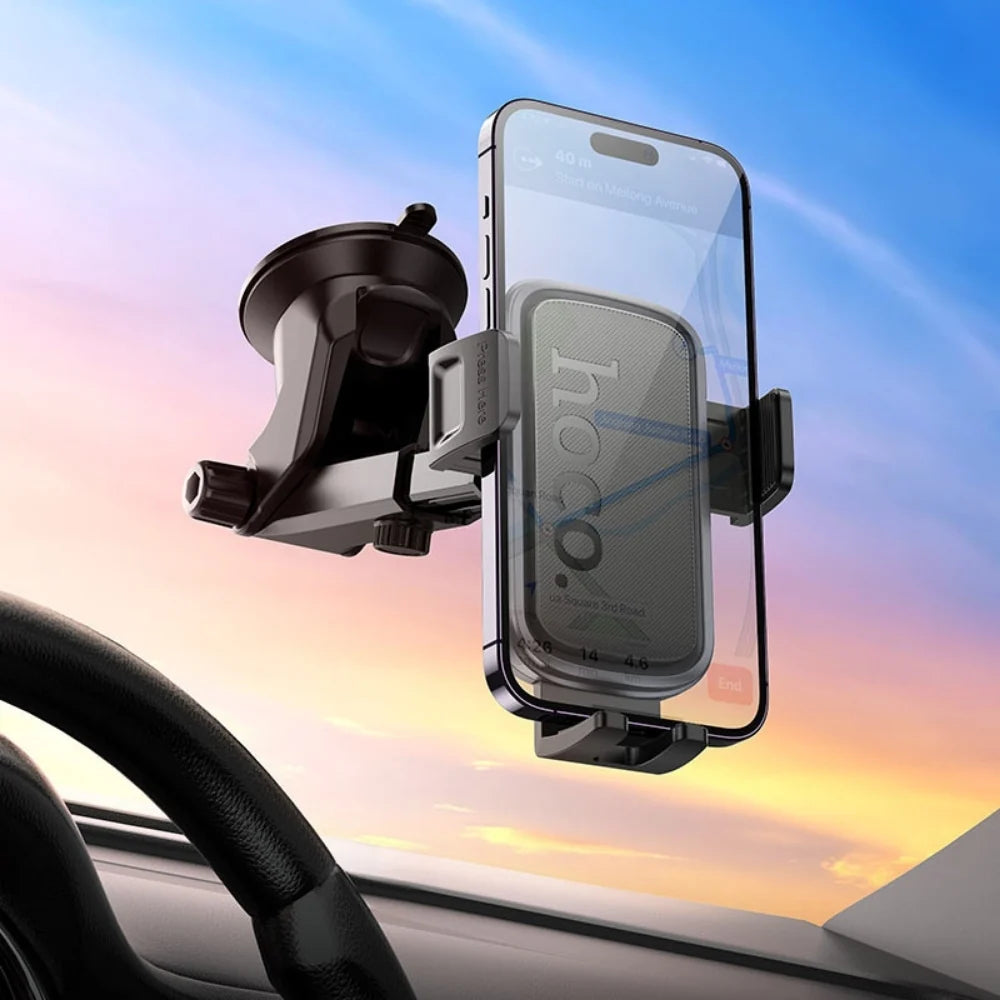 Hoco H79 Vista car dashboard phone holder mounted on vehicle dashboard, secure and adjustable for easy phone access.