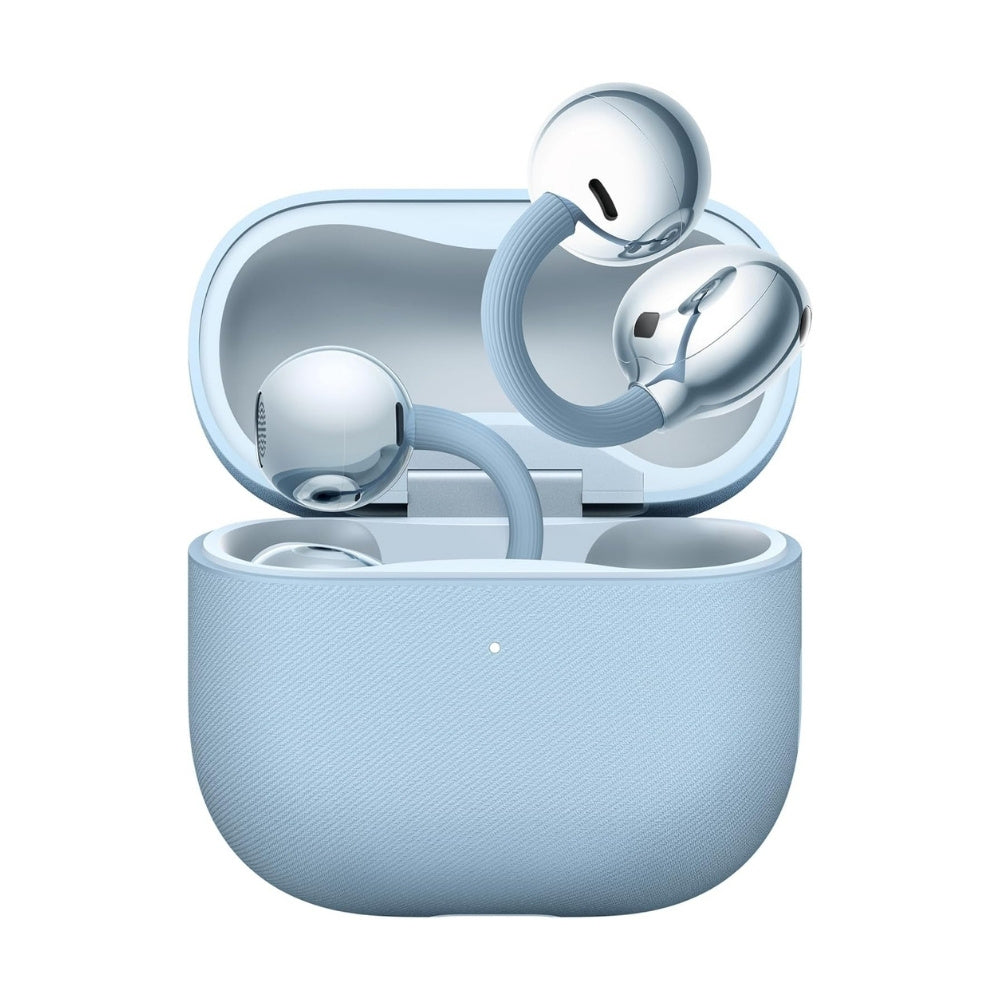 Huawei FreeClip 2 open-ear wireless earbuds resting on a surface, showcasing their clip-on design and sleek black finish.
