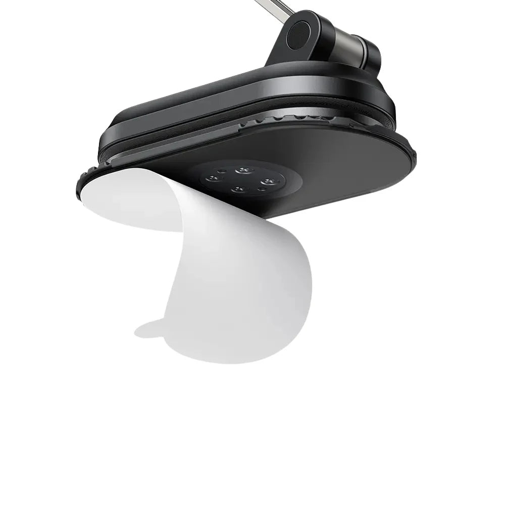 Mcdodo CM-624 Agile Magnetic Phone Holder mounted on a car dashboard holding a smartphone securely.