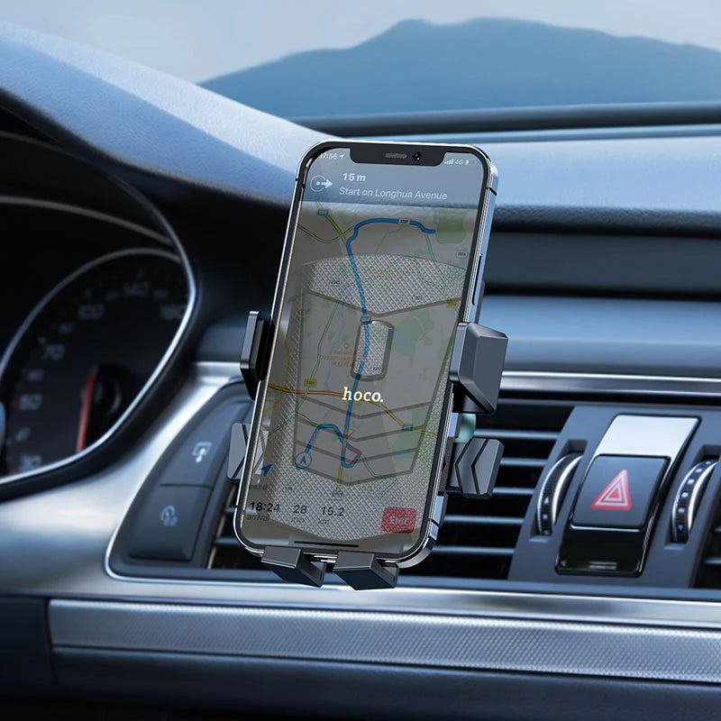 Hoco CA86 car air vent phone holder attached to vehicle air vent, holding a smartphone securely for hands-free use.